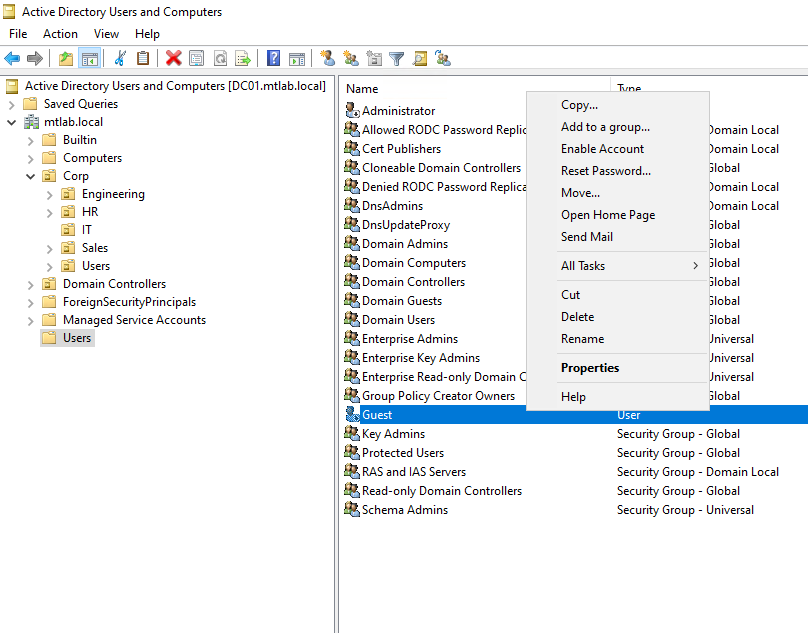 Verifying the Guest account is disabled — right-click shows Enable Account option